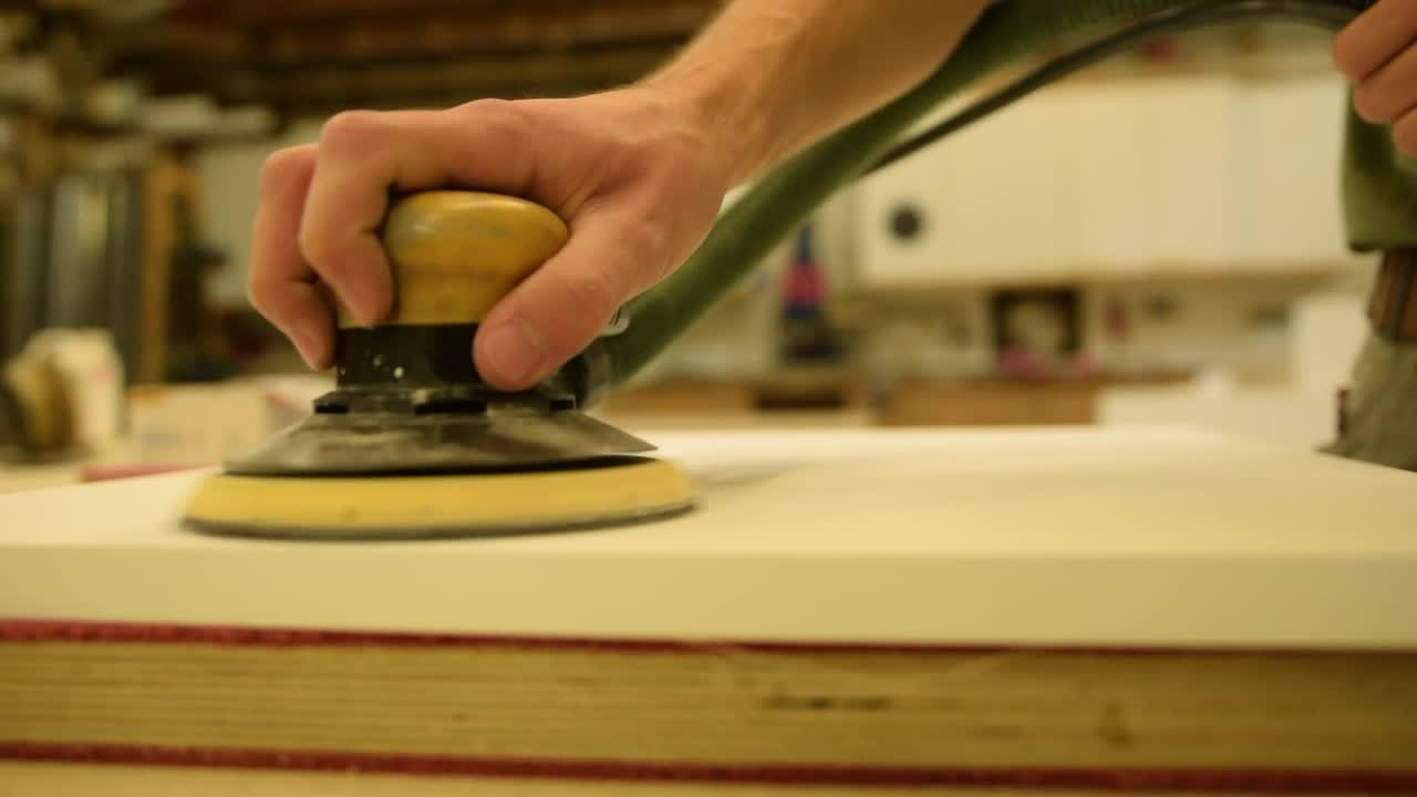 Stock Video Man Sanding A Table With A Sande Animated Wallpaper - Free Download