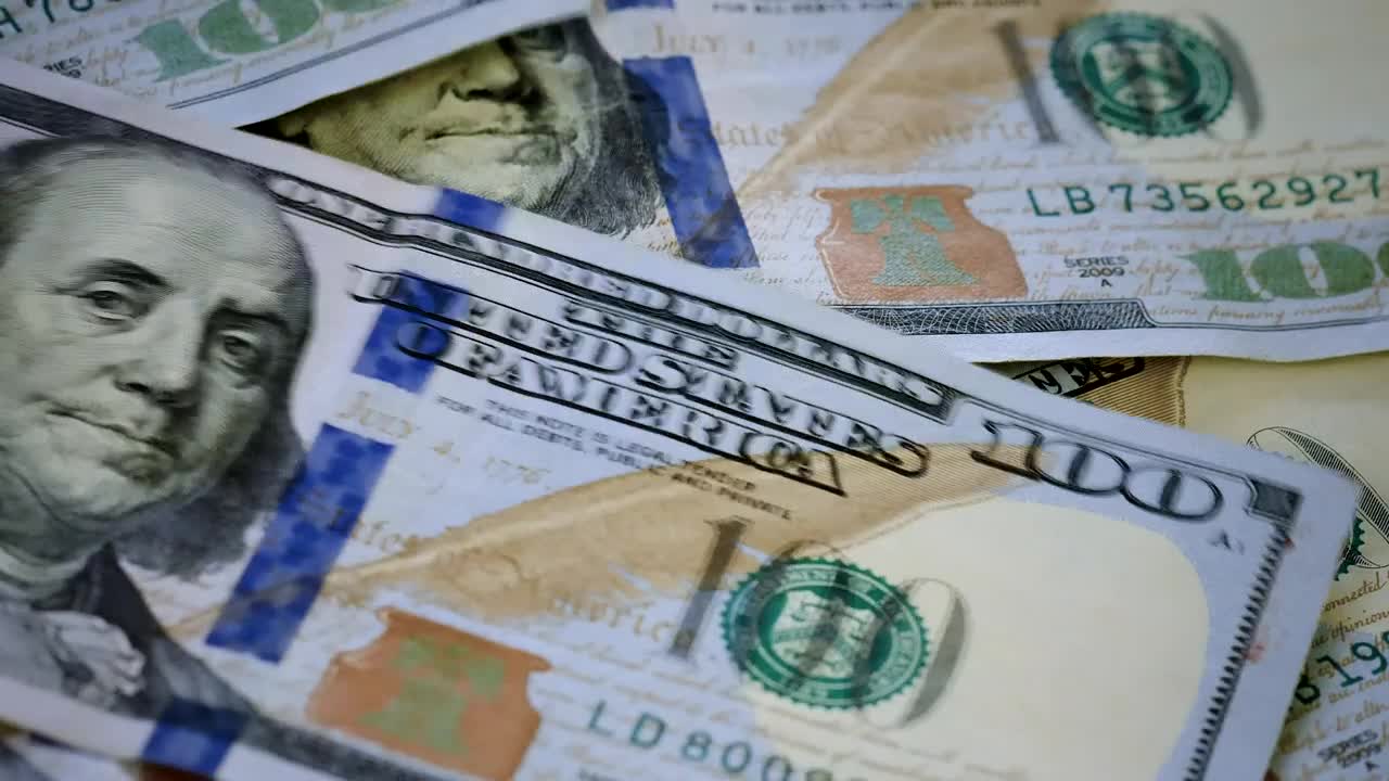 Free Video Stock surface while  dollar bills fall messily Live Wallpaper - Free Download