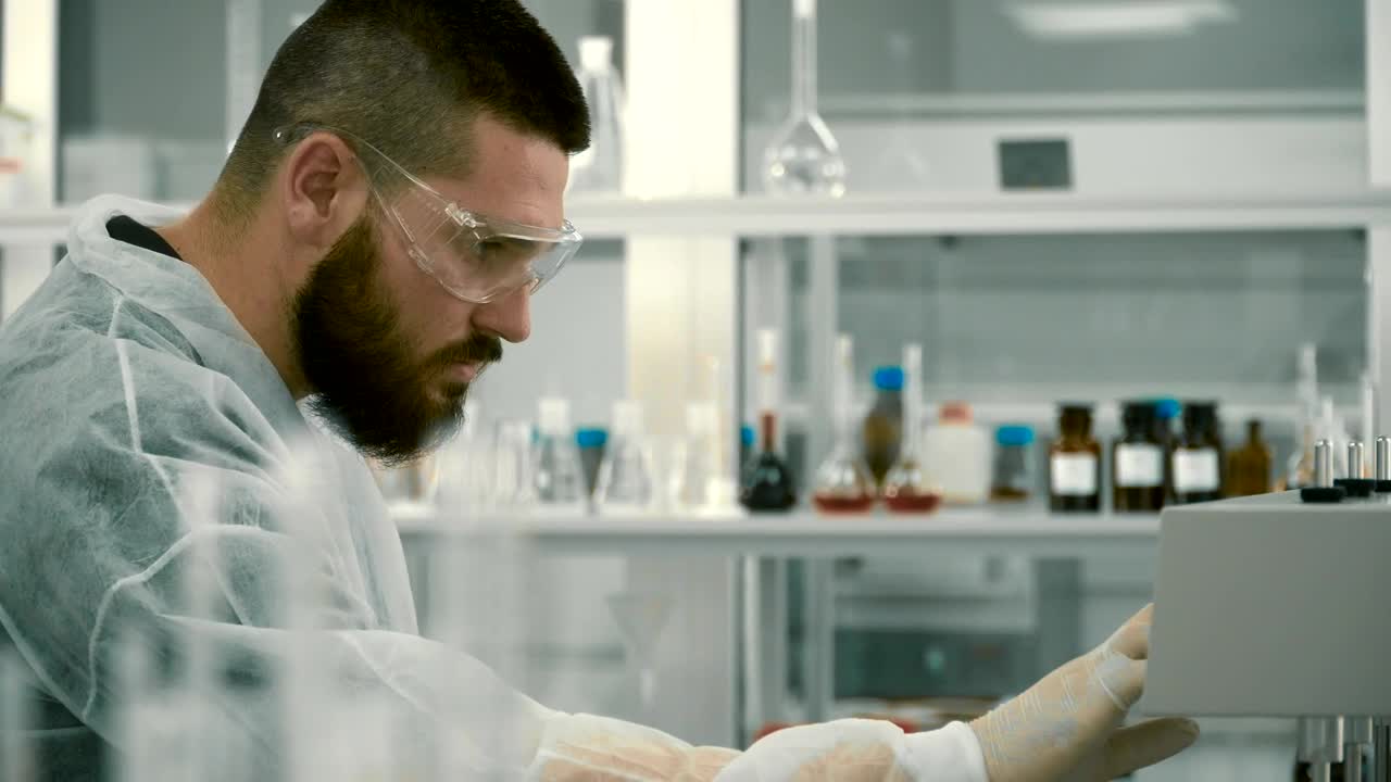 Free Stock Video Scientist Adjusting Equipment In A Laboratory Live Wallpaper - Free Download