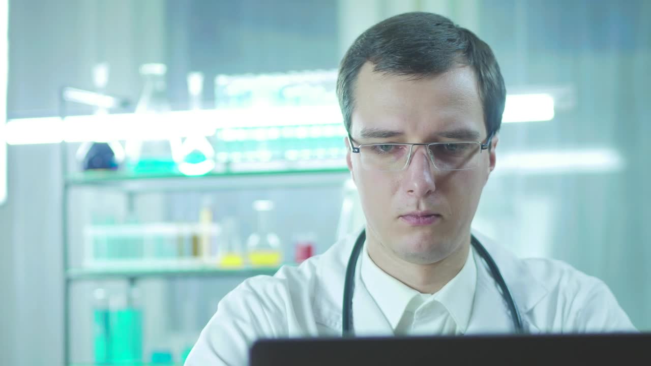 Stock Video Doctor In The Lab Looking At The Computer Screen Live Wallpaper For PC - Free Download