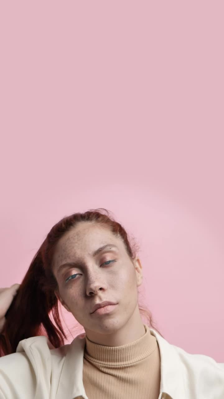 Stock Video Girl Modeling Captivatingly On A Pink Background Live Wallpaper For PC - Free Download