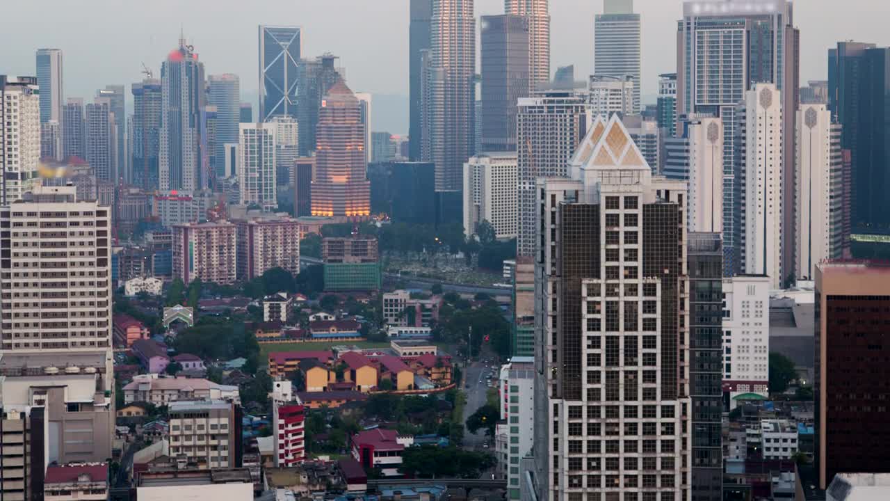 Stock Video From Day To Night In Kuala Lumpur Cityscape Live Wallpaper For PC - Free Download