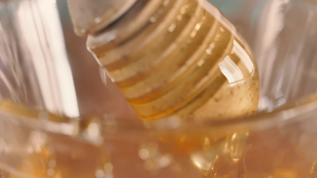 Stock Video Honey Dipper With Honey Animated Wallpaper - Free Download