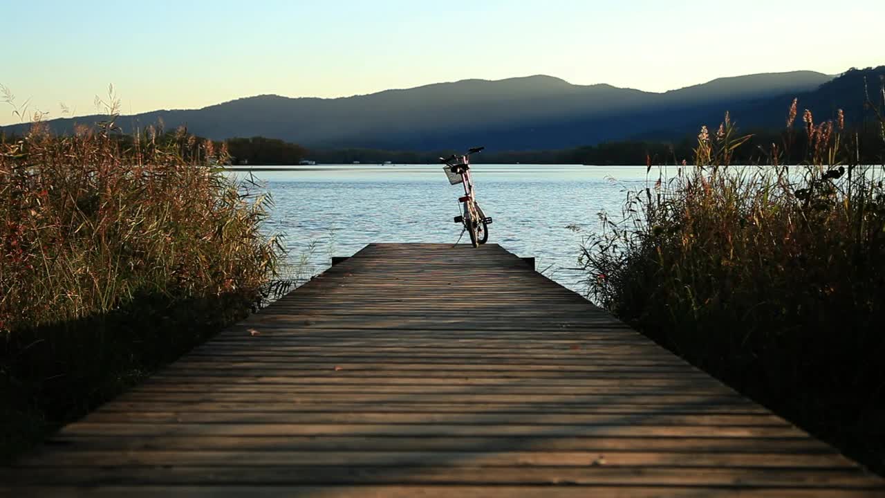 Stock Video Bicycle On A Pier Next To A River Live Wallpaper For PC - Free Download