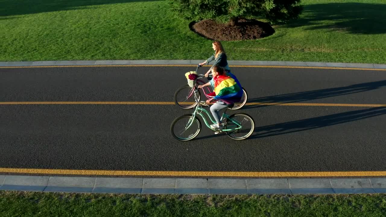 Stock Video Couple Riding Bikes Down An Empty Road Live Wallpaper For PC - Free Download