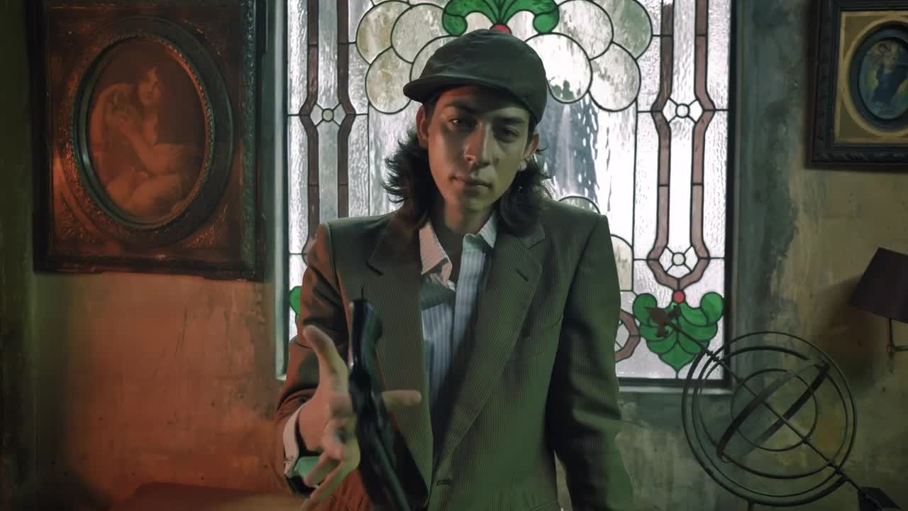 Stock Video Mobster Aiming His Pistol In An Old Fashioned Settin Animated Wallpaper - Free Download