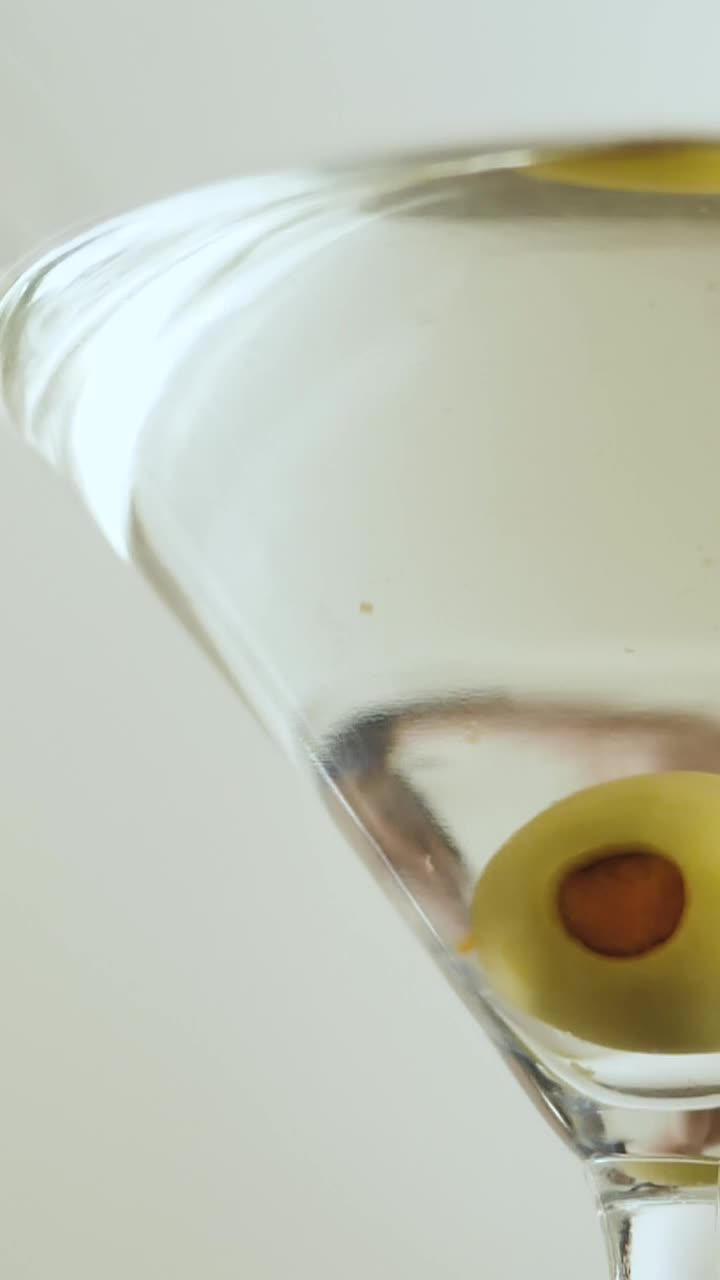 Stock Video Martini Cocktail With Olive Animated Wallpaper - Free Download