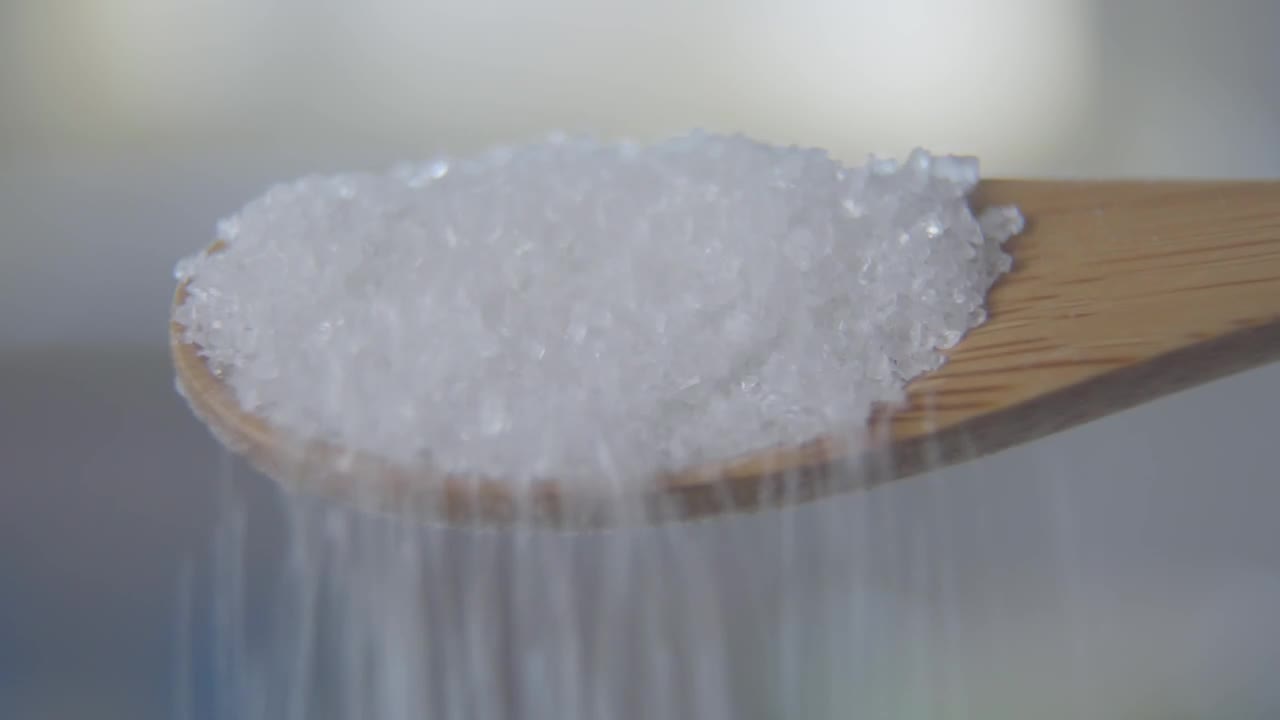 Video Stock Closeup Of Sugar Spilling From Wooden Spoon Live Wallpaper For PC - Free Download