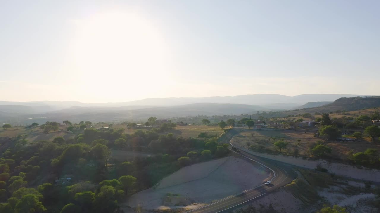 Stock Video Flying Over A Warm And Arid Landscape At Sunrise Live Wallpaper For PC - Free Download