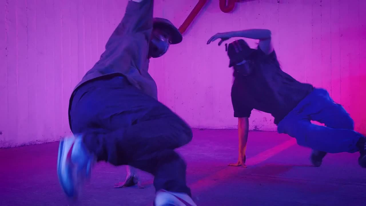 Stock Video Men Dancing Break Dance Taking Care Of Themselves With Animated Wallpaper - Free Download