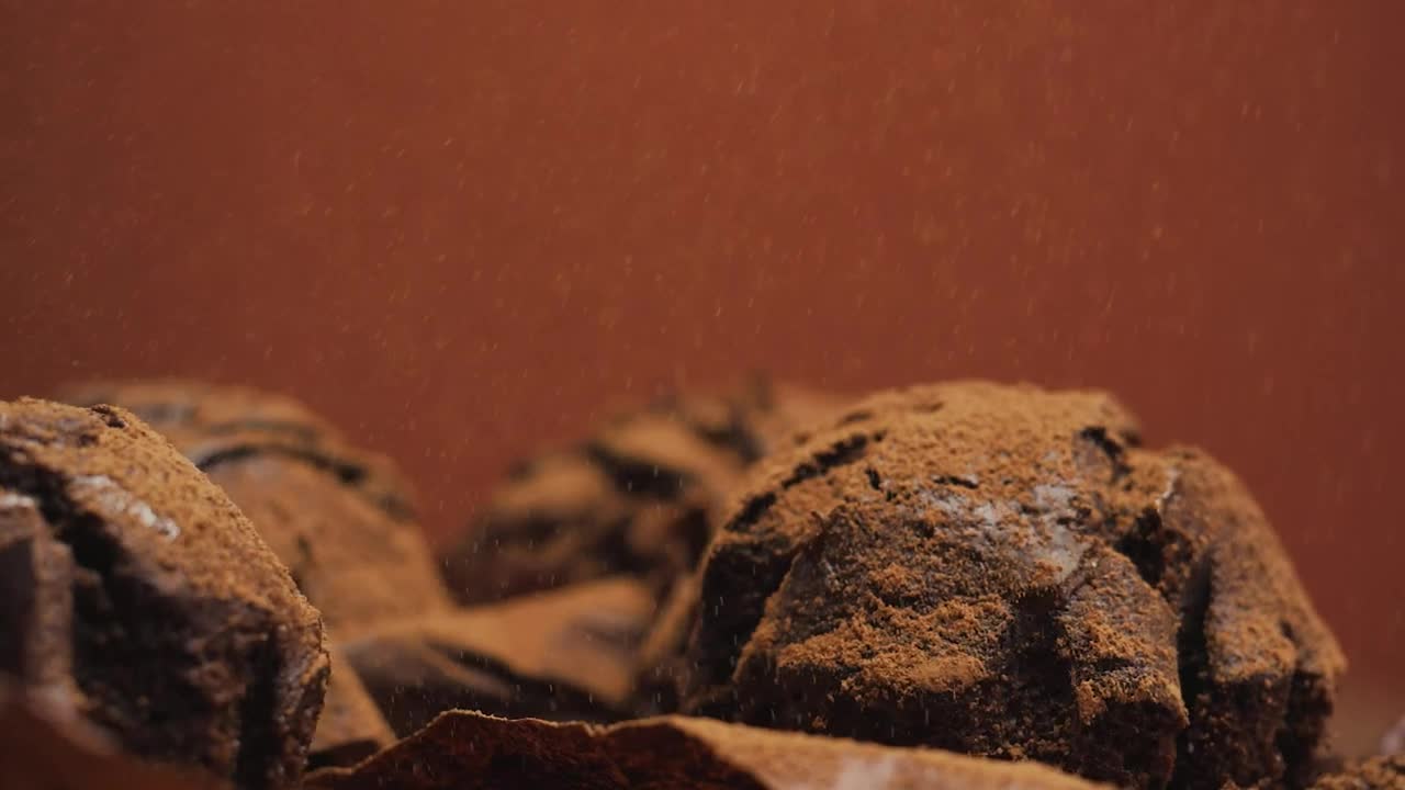 Free Video Stock Spread Chocolate Powder Over Chocolate Cupcakes Live Wallpaper - Free Download