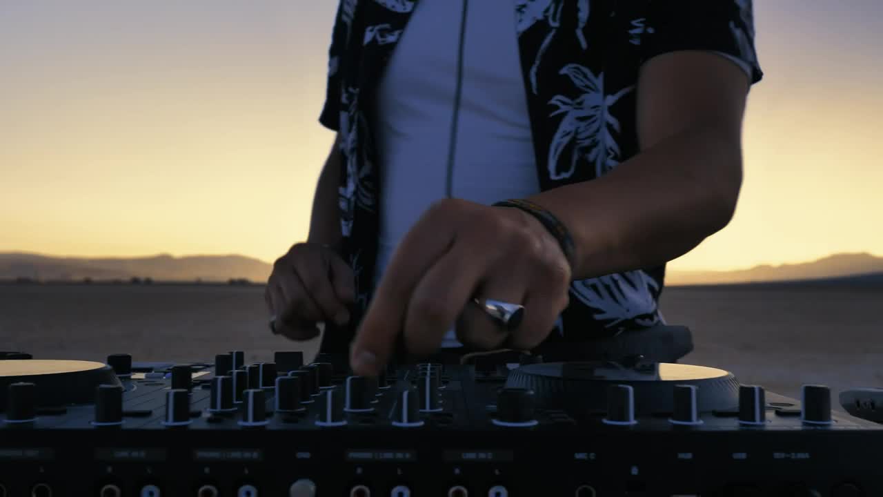 Free Video Stock Skillful Hands Of A Dj Mixing Music Outdoors Live Wallpaper - Free Download