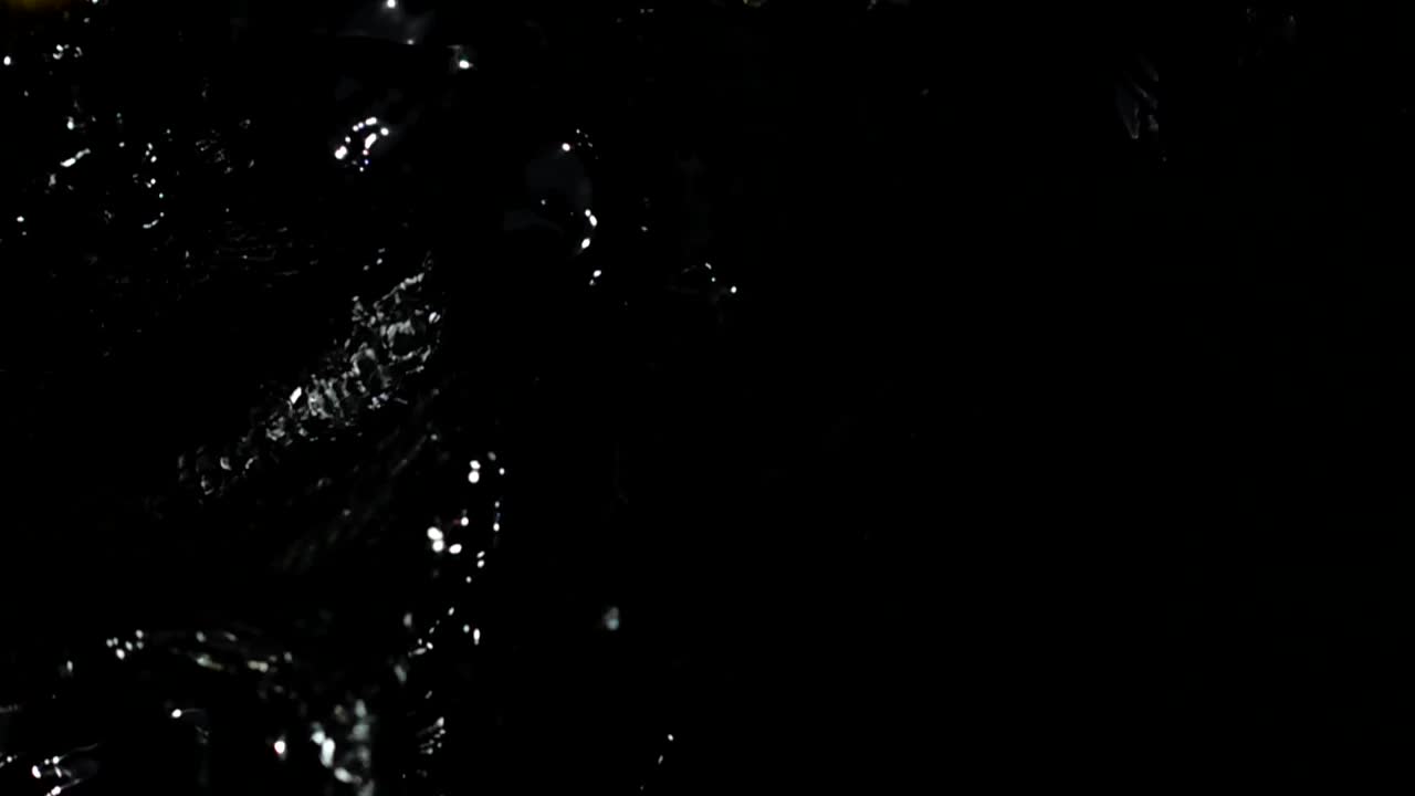 Stock Video Lemon Slices Falling Into Dark Water Animated Wallpaper - Free Download