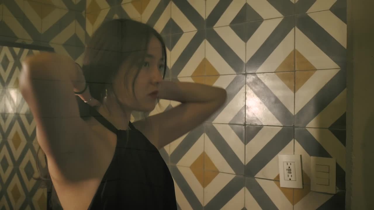 Free Stock Video Reflection In A Womans Mirror As She Ties Her Hair Live Wallpaper - Free Download