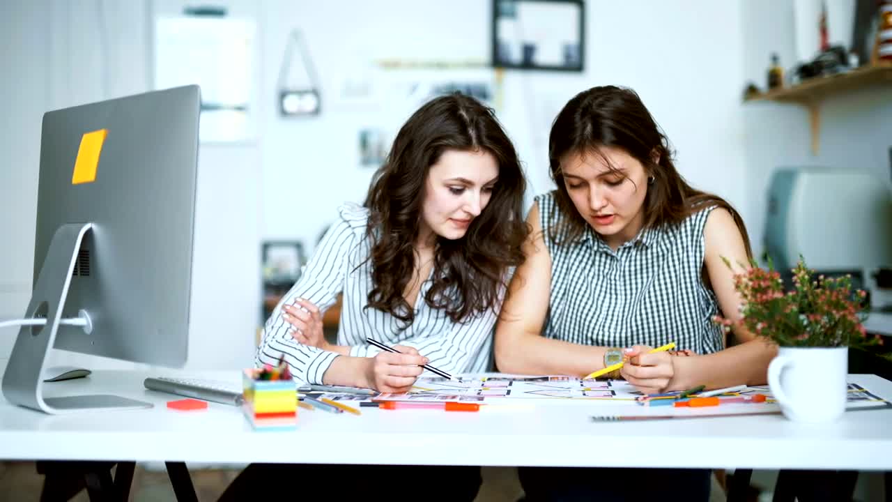 Free Stock Video Young Architects Working On A Blueprint With Pencils Live Wallpaper - Free Download