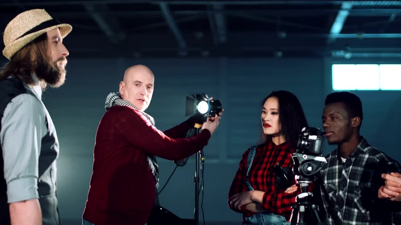 Free Video Stock teaching photography lighting to students Live Wallpaper - Free Download