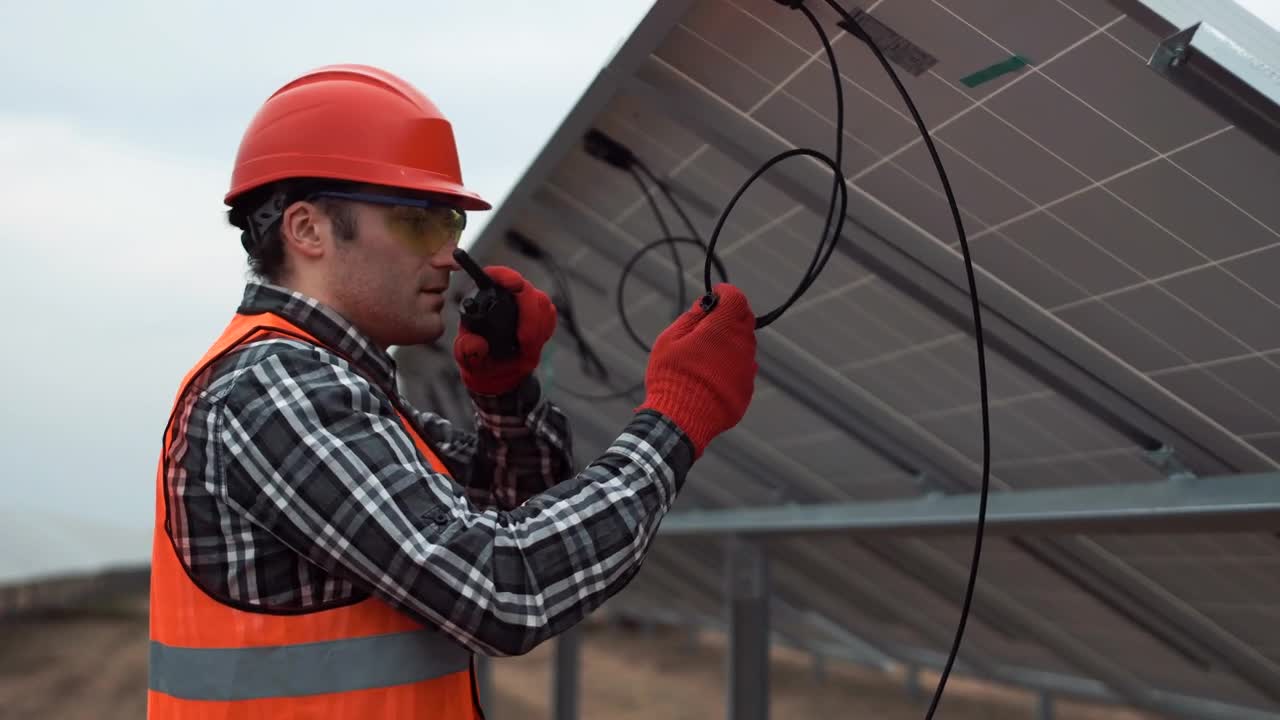 Stock Video Engineer Installing Solar Panels Live Wallpaper For PC - Free Download