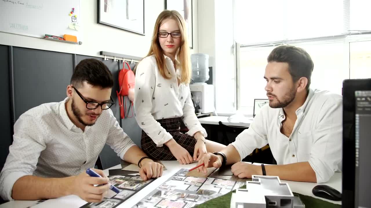 Stock Video Group Of Architects Discussing A Building Model Live Wallpaper For PC - Free Download