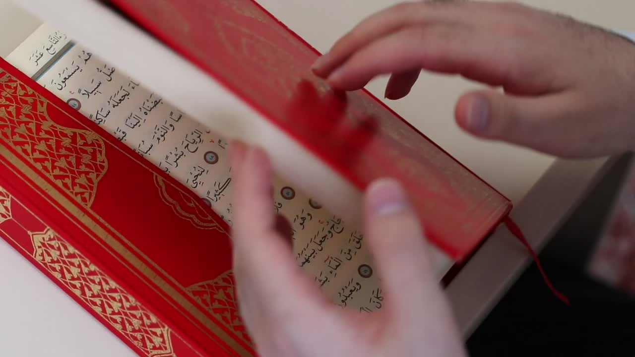 Stock Video Opening A Red Thick Book In Arabic Quran Live Wallpaper - Free Download
