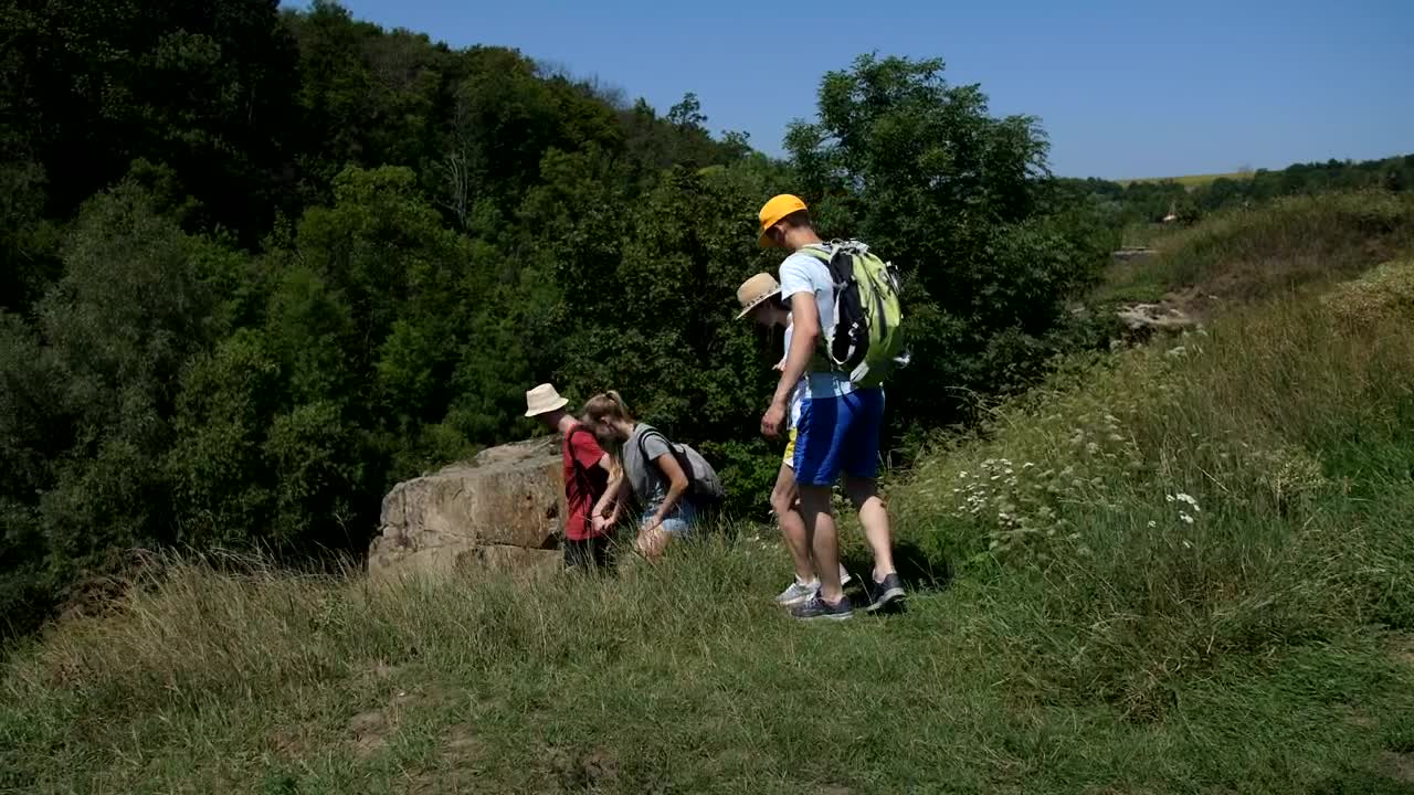 Stock Video Hikers Moving Down A Steep Path Animated Wallpaper - Free Download