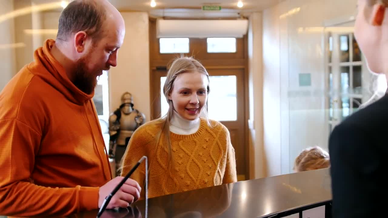 Stock Video Family Doing Check In At The Hotel Live Wallpaper For PC - Free Download