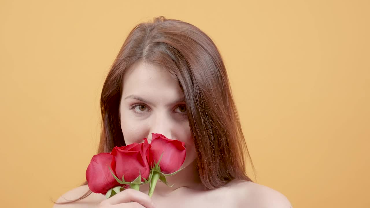 Video Stock Portrait Of Young Woman Smelling Red Roses Live Wallpaper Free - Free Download