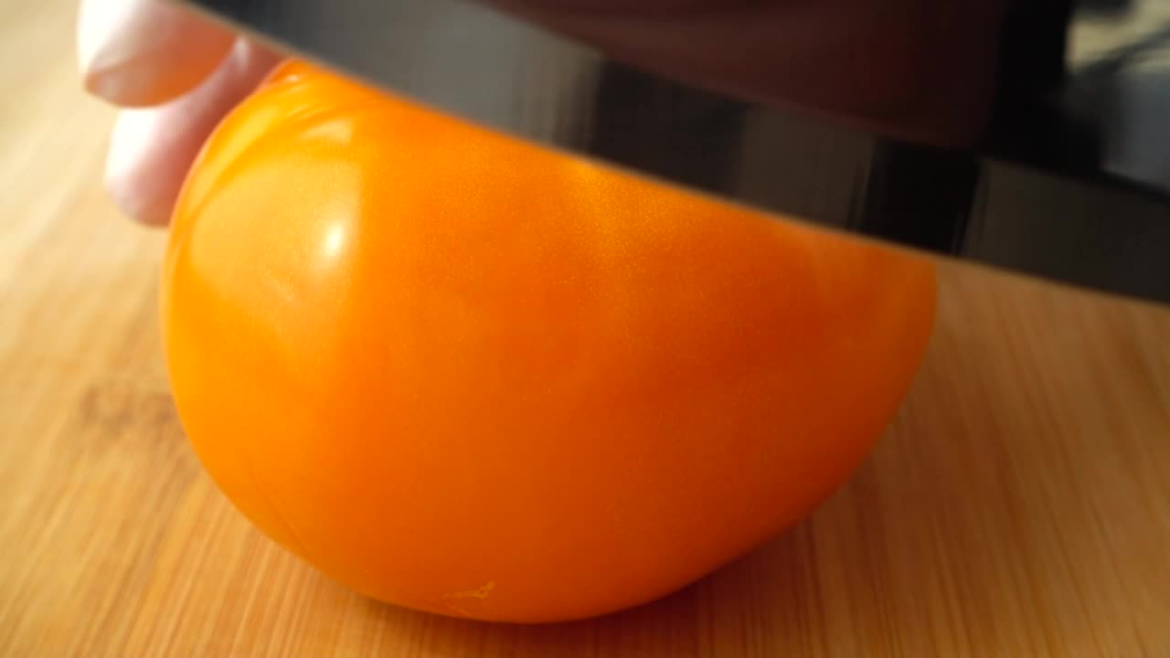 Video Stock Chef Cutting A Tomato With A Clean Knife Live Wallpaper For PC - Free Download