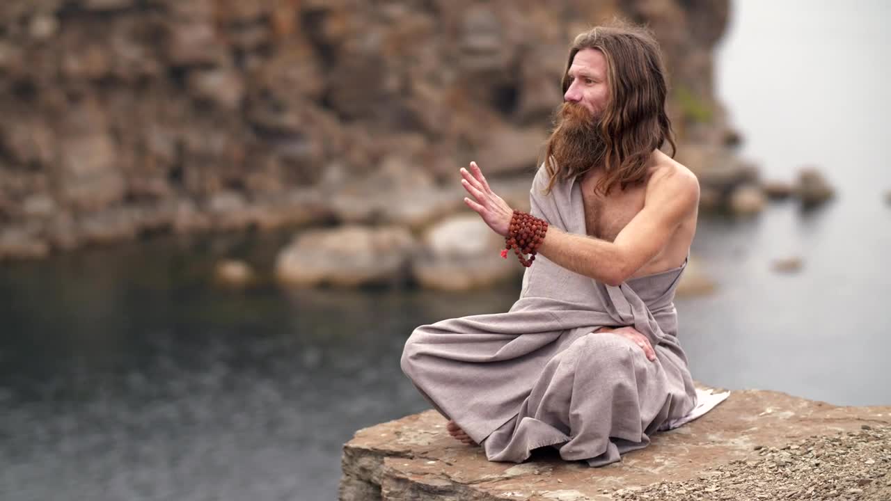 Free Video Stock Spiritual Man Meditating By The Sea Live Wallpaper - Free Download