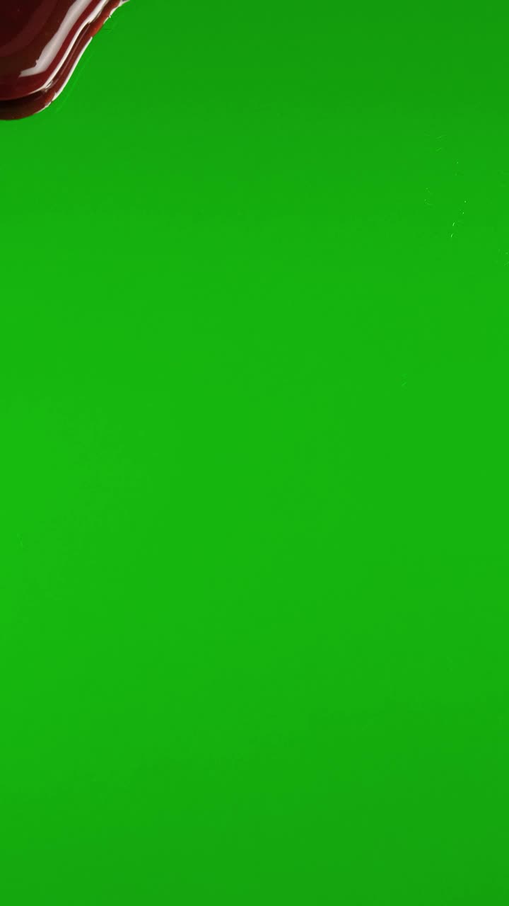 Video Stock Chocolate Syrup Covering A Green Background Live Wallpaper For PC - Free Download