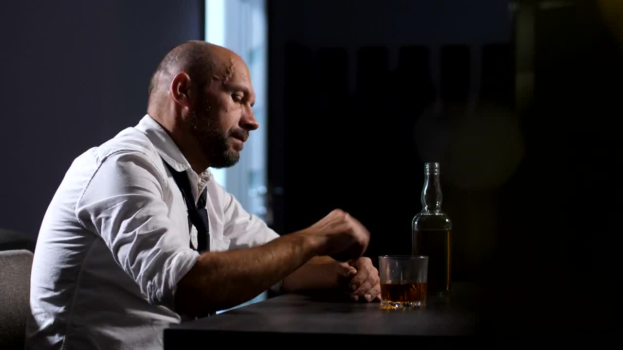 Stock Video Depressed Man Holding A Drink Live Wallpaper For PC - Free Download