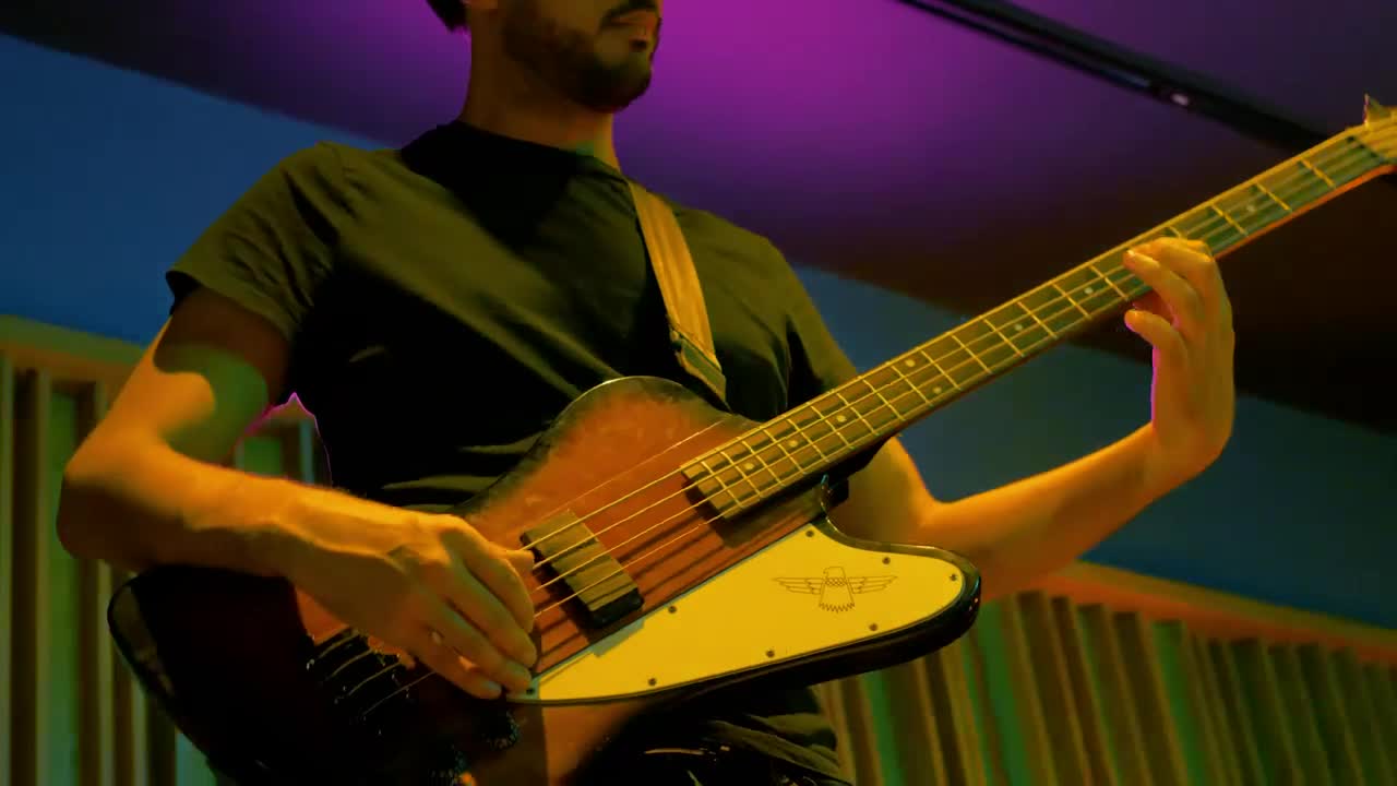Stock Video Man Playing Bass During A Live Performanc Animated Wallpaper - Free Download