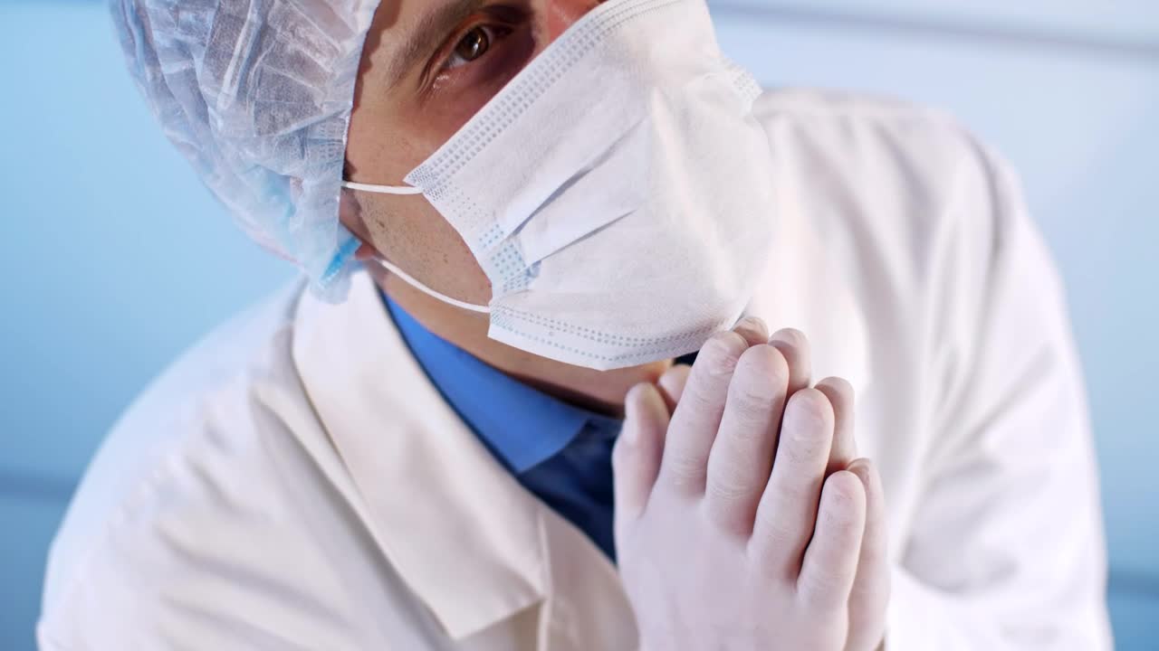 Stock Video Doctor With Face Mask Praying To Heaven Live Wallpaper For PC - Free Download