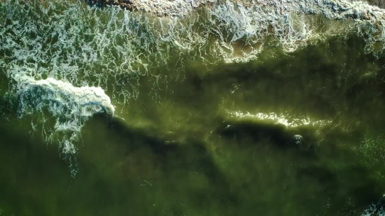 Free Video Stock texture of sea waves reaching the beach Live Wallpaper - Free Download