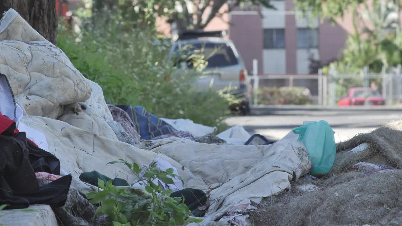 Stock Video Dirty And Damaged Fabrics Thrown In The Street Live Wallpaper For PC - Free Download