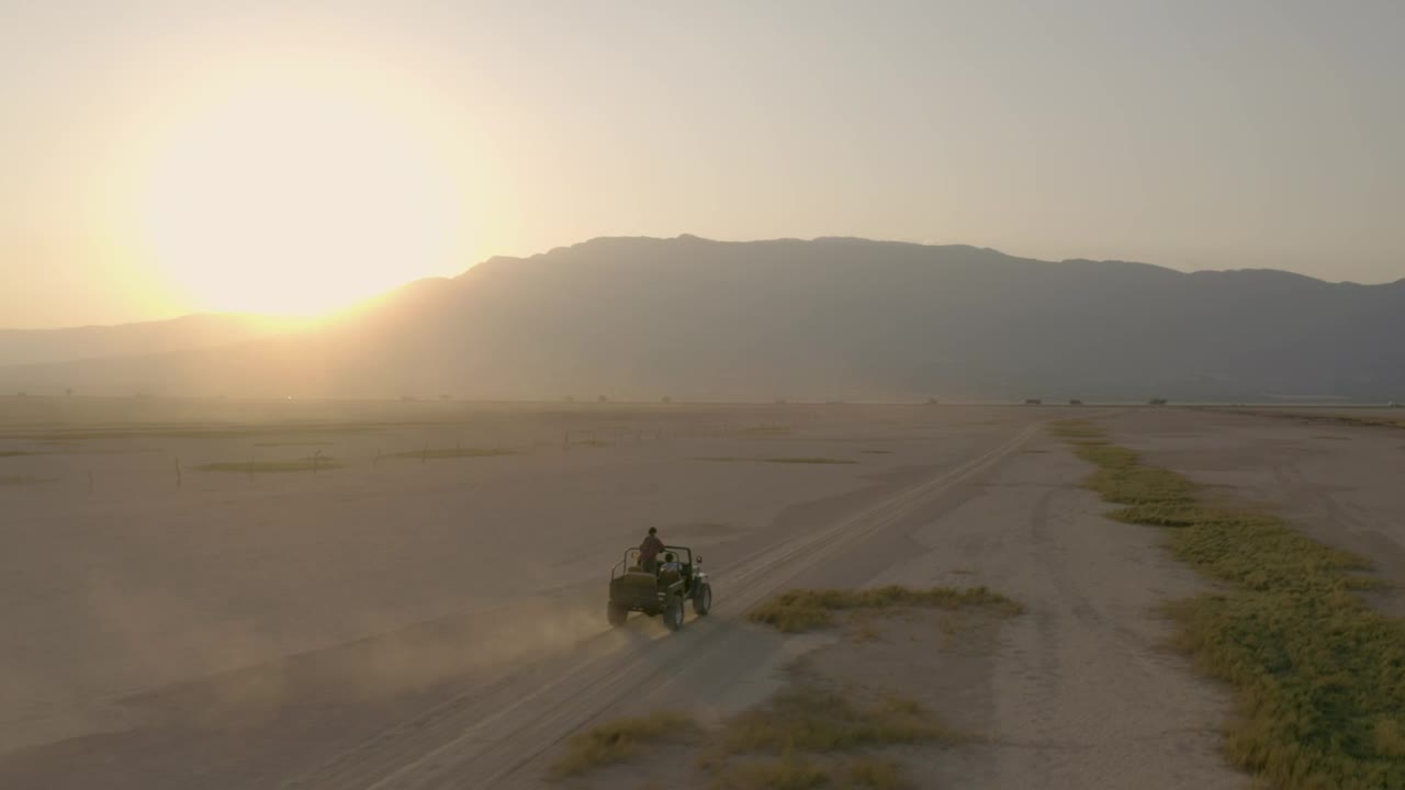 Stock Video Jeep Crossing An Arid Desert During Sunset Animated Wallpaper - Free Download