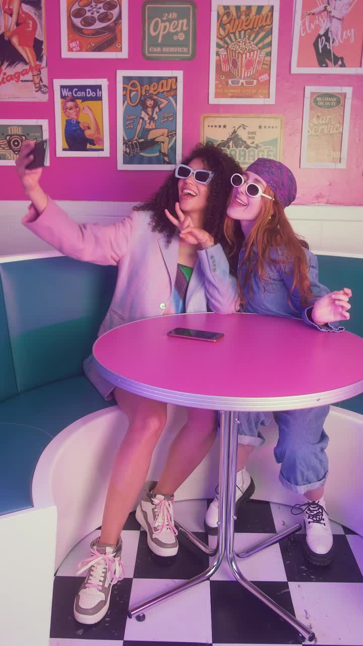 Free Stock Video Two Girls Taking Selfies In A Retro Spot Live Wallpaper - Free Download