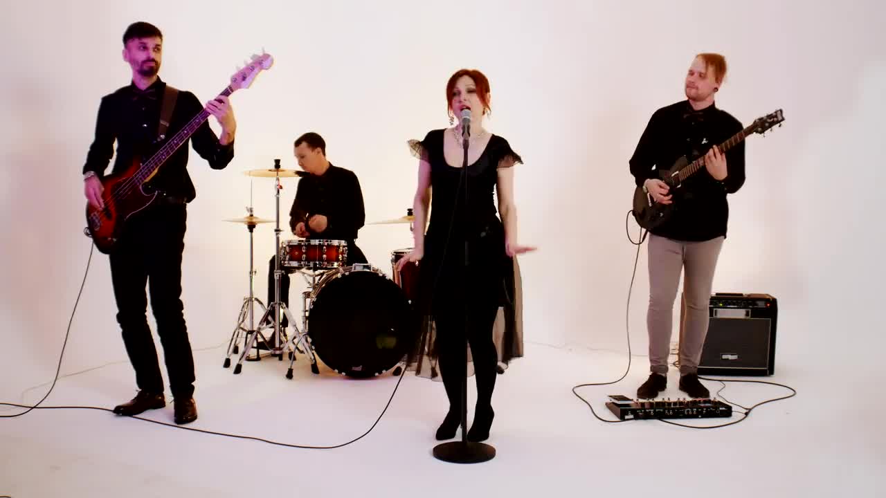 Free Stock Video Rock Band Playing A Song In A Bright Studio Live Wallpaper - Free Download