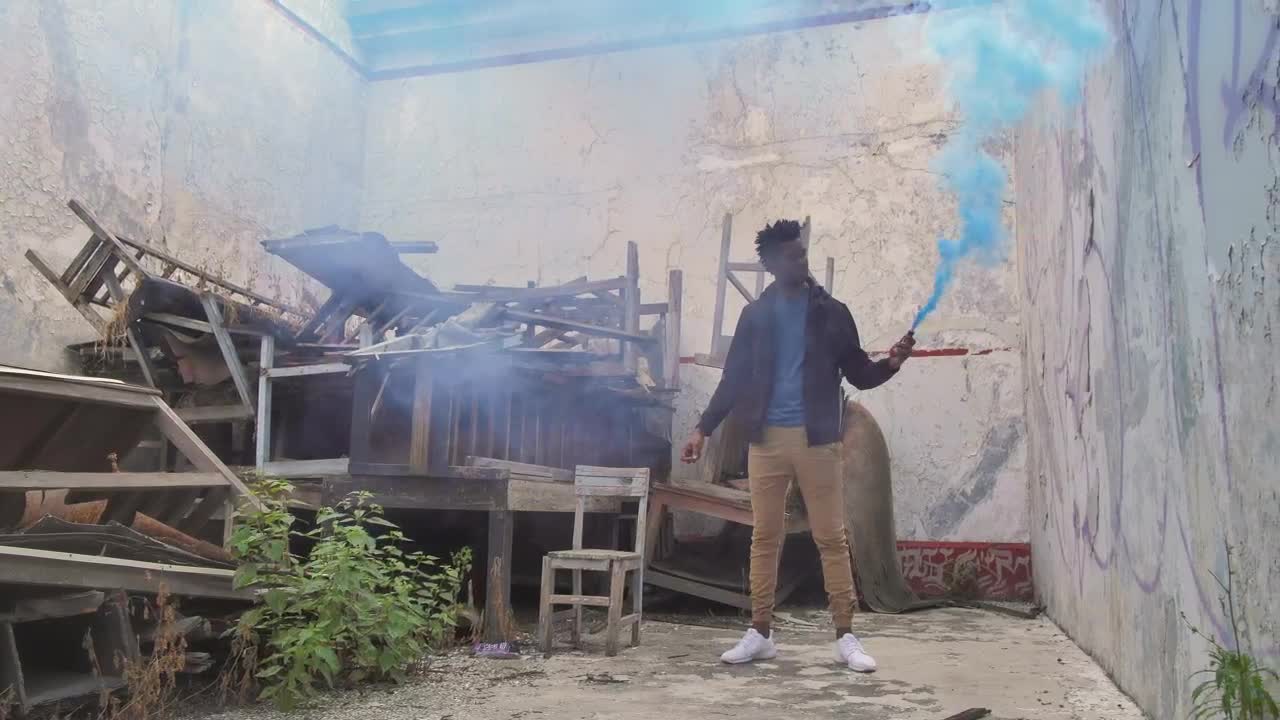 Stock Video Man And Smoke Bomb Animated Wallpaper - Free Download