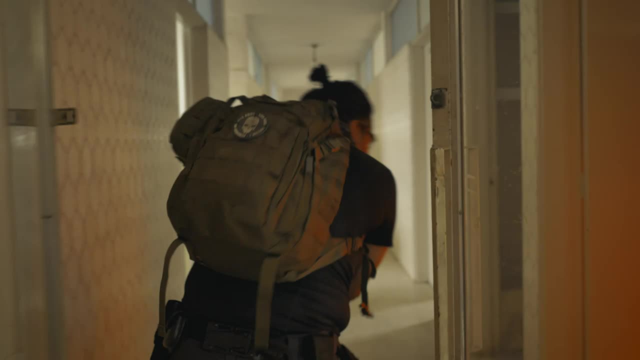 Stock Video Mercenary Looking For Zombies In An Abandoned Buildin Animated Wallpaper - Free Download