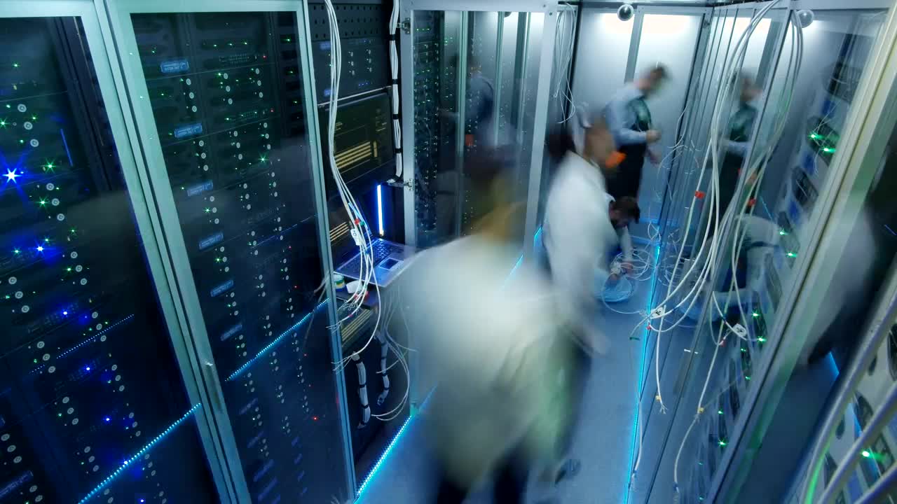Free Video Stock timelapse of engineers working on data center Live Wallpaper - Free Download