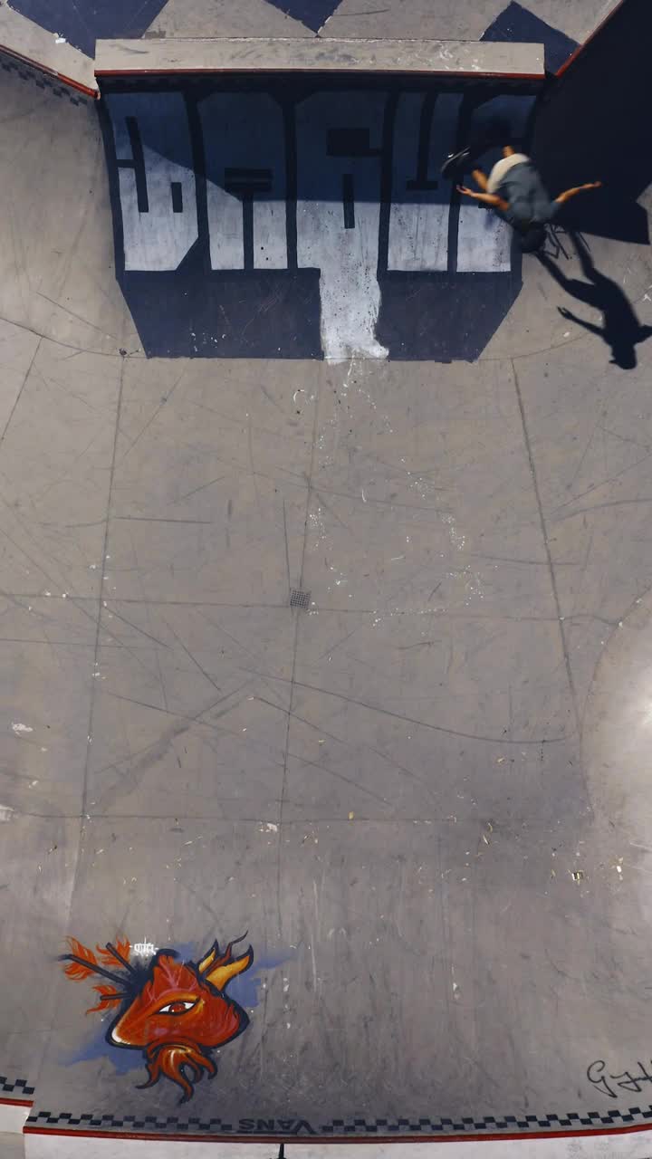 Free Video Stock top aerial shot of a skater skating on a half Live Wallpaper - Free Download