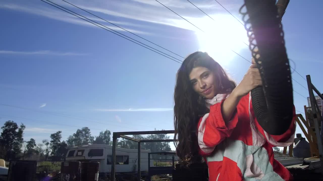 Stock Footage Woman At Junkyard Live Wallpaper - Free Download