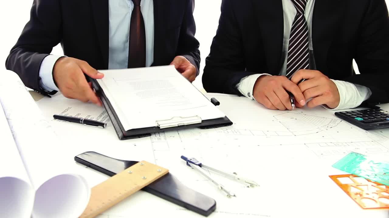 Free Stock Video Two Businessmen In Suits Reviewing Some Documents Live Wallpaper - Free Download