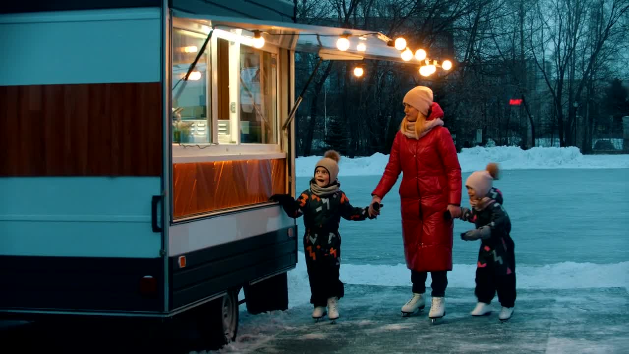 Stock Video Family At A Donut Stand After Ice Skating Live Wallpaper For PC - Free Download