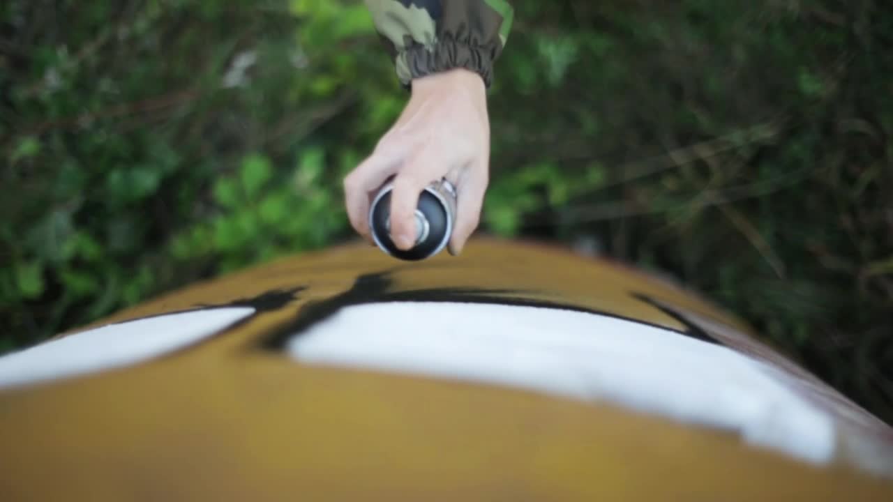 Stock Video Man Spraying Graffiti On A Wal Animated Wallpaper - Free Download