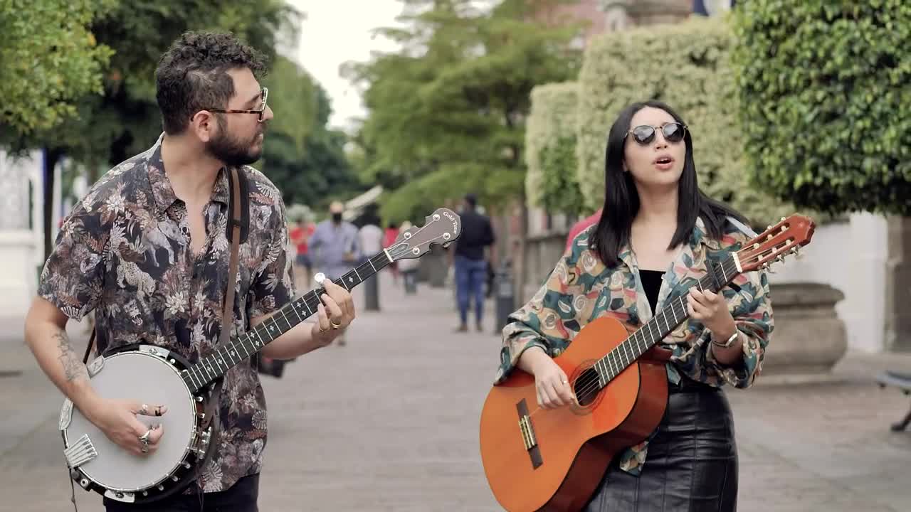 Stock Video Male And Female Friends Walking Through A Park While Playing Animated Wallpaper - Free Download