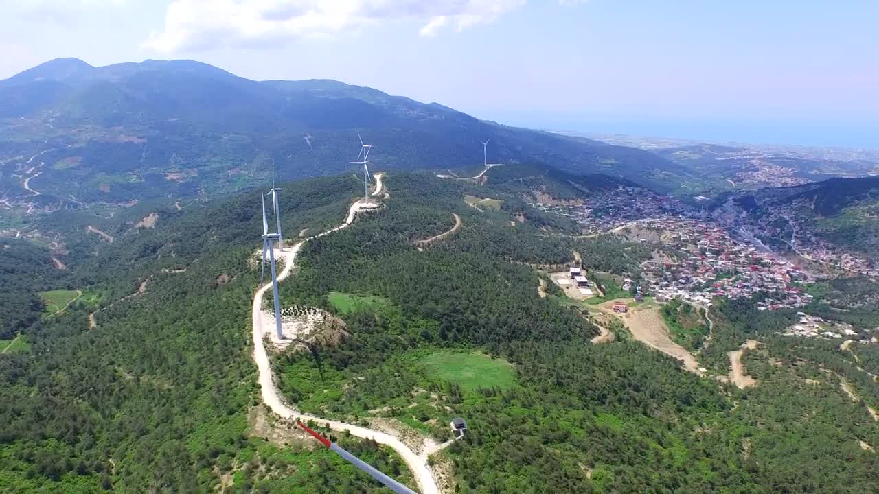 Stock Footage Wind Turbines In The Edge Of A City Live Wallpaper - Free Download