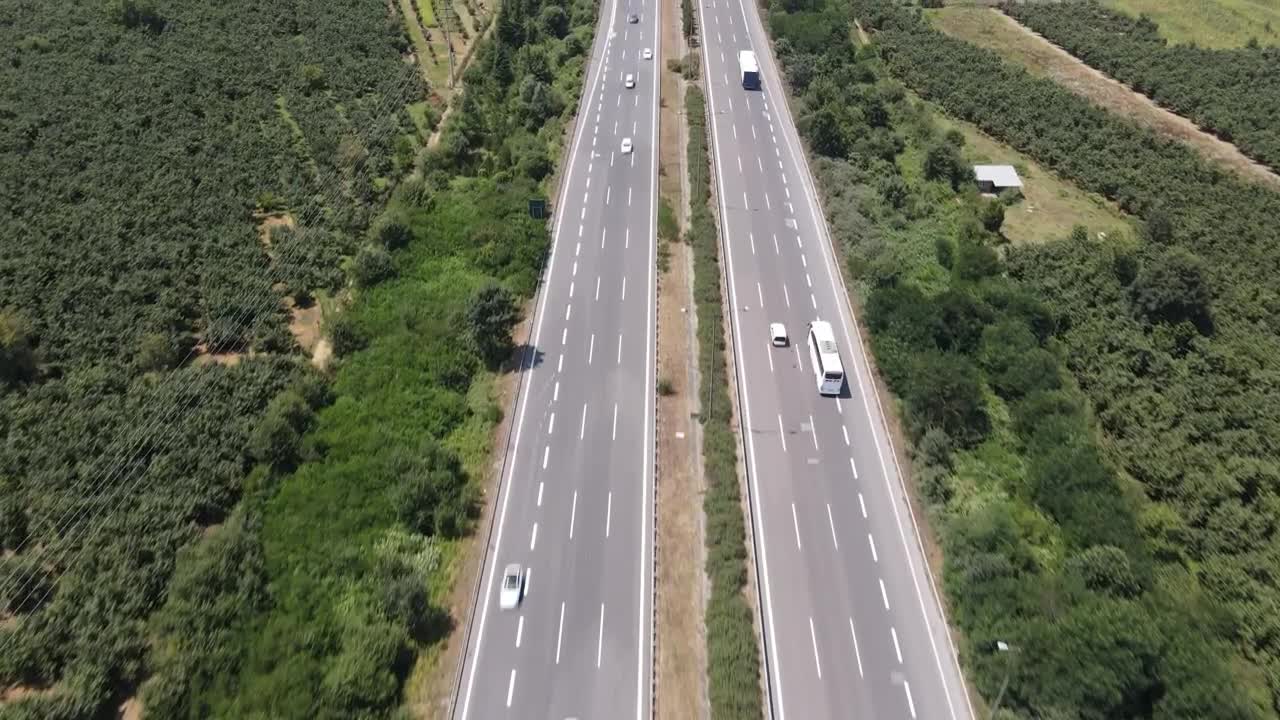 Stock Video Highway With Cars Surrounded By Vegetation Animated Wallpaper - Free Download