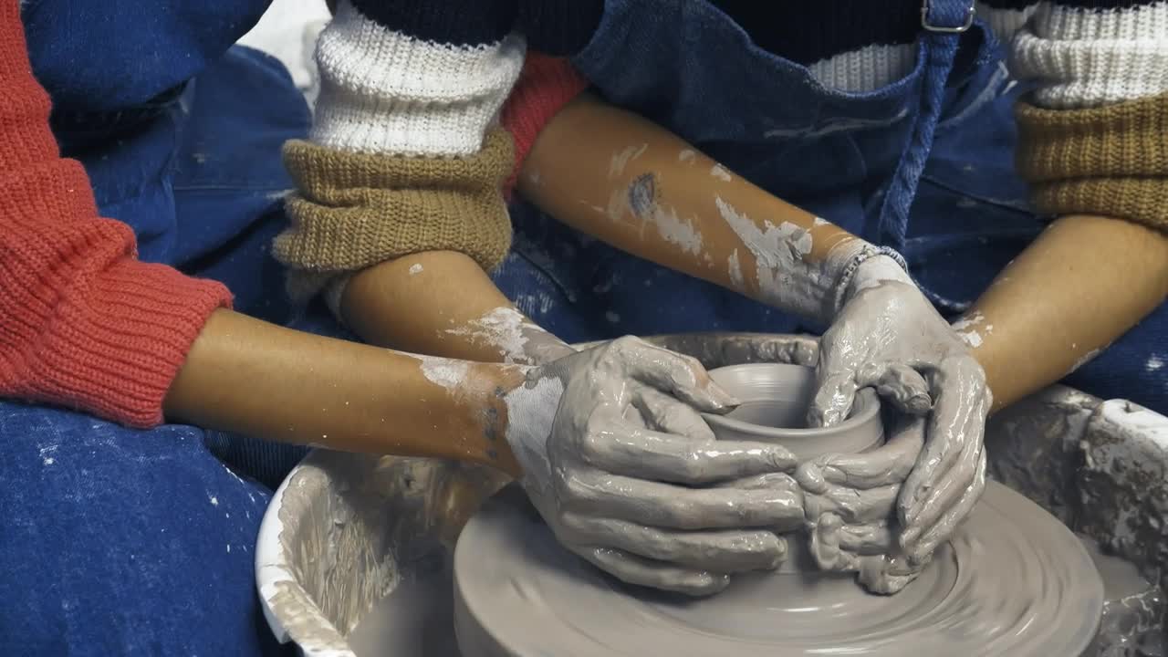Stock Video Lgbtq Girls Making A Clay Vase Together Animated Wallpaper - Free Download