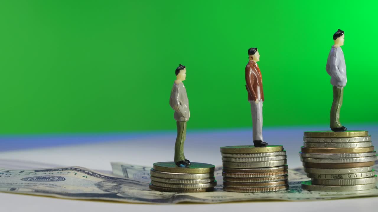 Stock Video Figures Standing On Stacked Coins Live Wallpaper For PC - Free Download